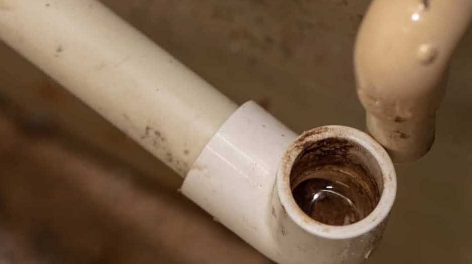 How to clear a clogged air conditioner drain line