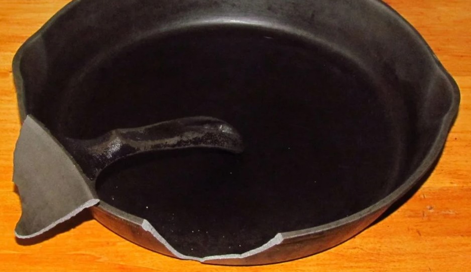 damaged cast iron pan